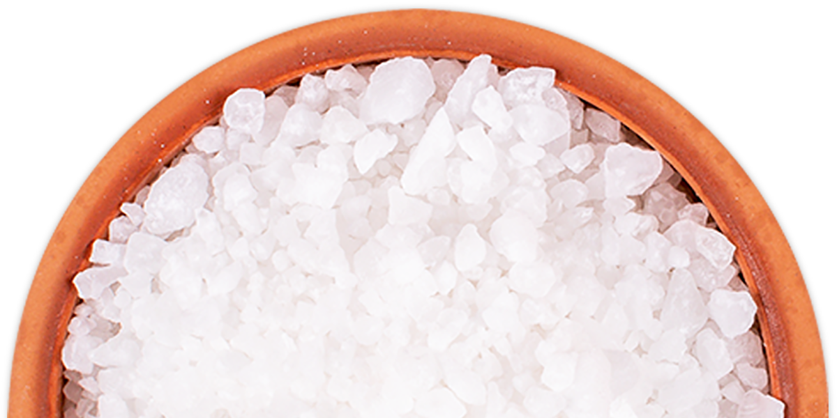 A bowl of salt on a gradient background