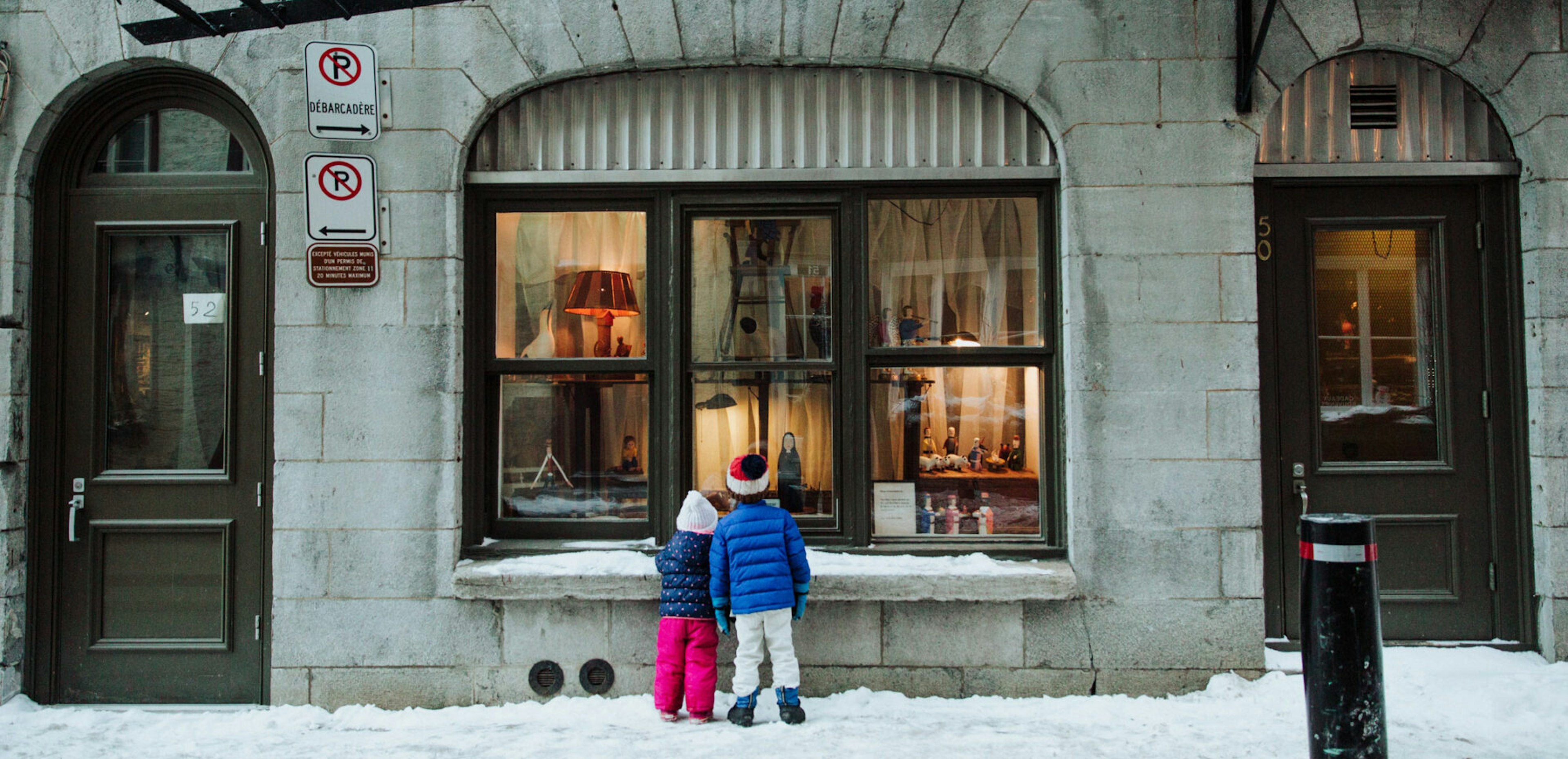 kids looking through window