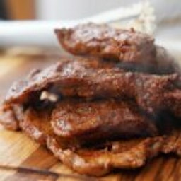 cooked meat on cutting board