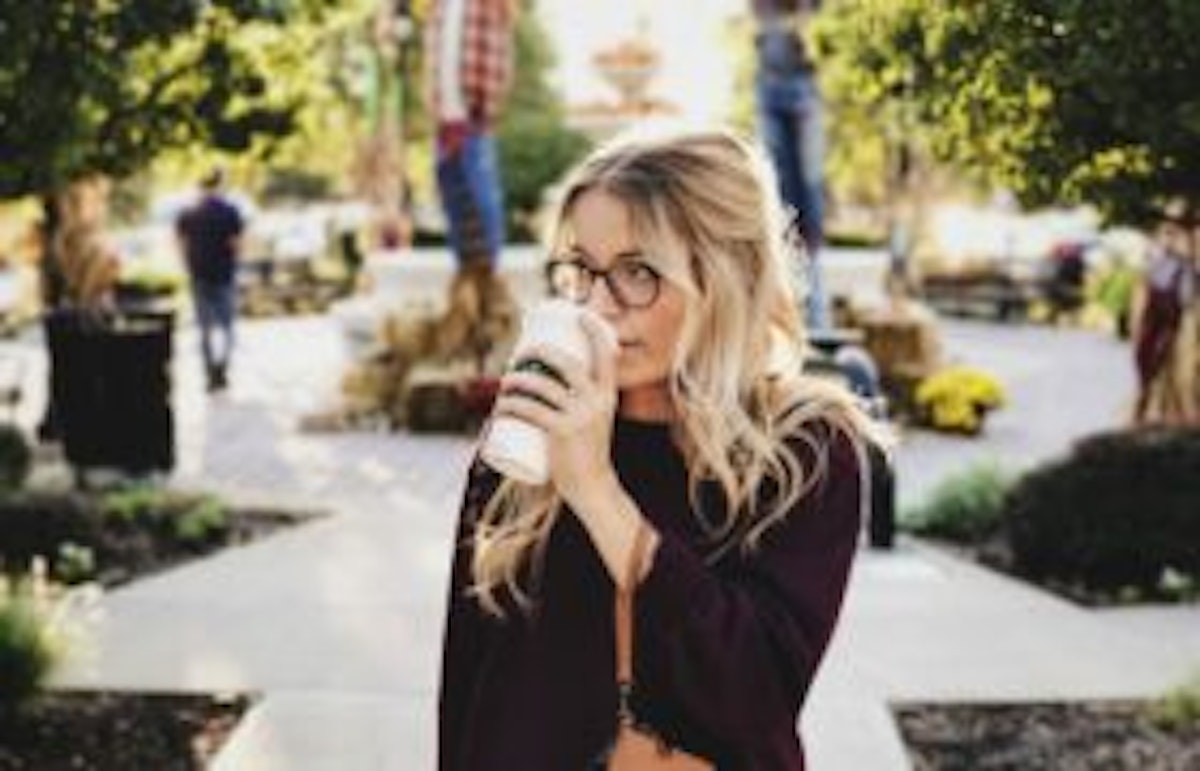 woman drinking starbucks