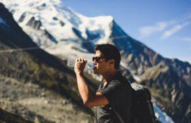 drinking water while hiking