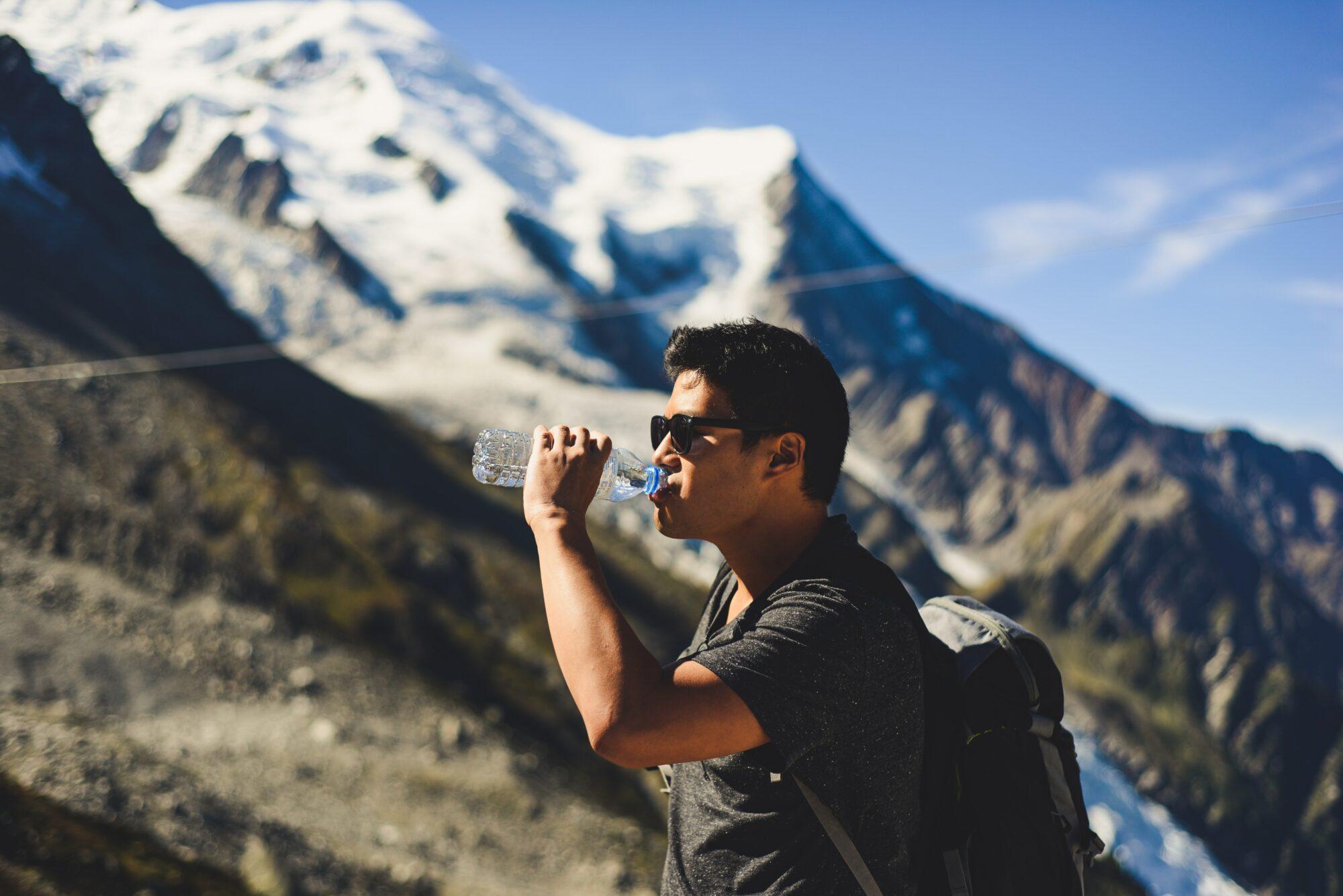 drinking water while hiking