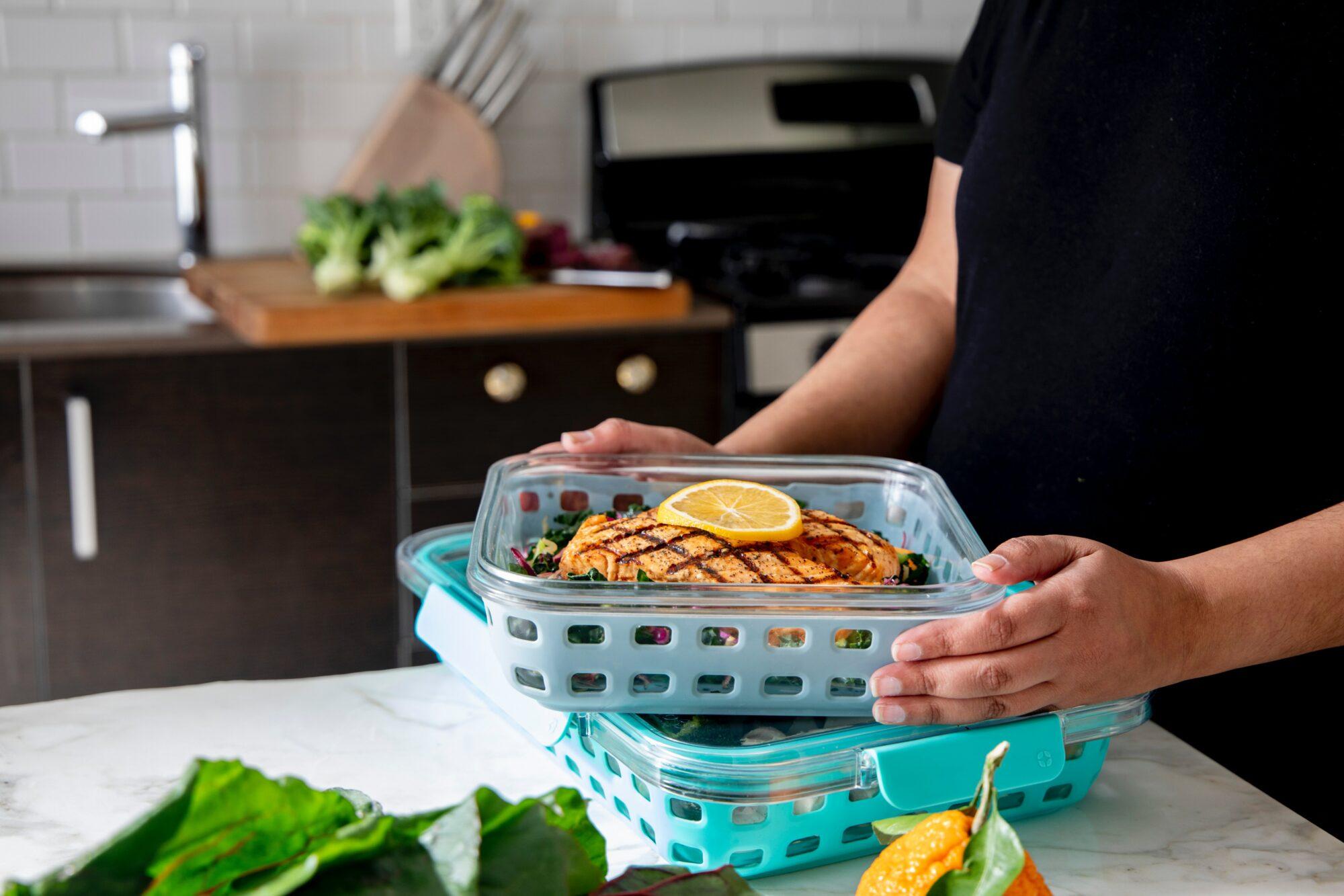 putting food into containers