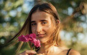 woman holding flower